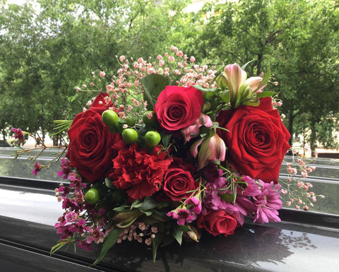 Bouquet de fleurs ton rouge